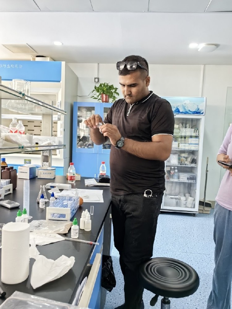 Uzbek customer preparing a soil extract for HM-GT7 nutrient analysis