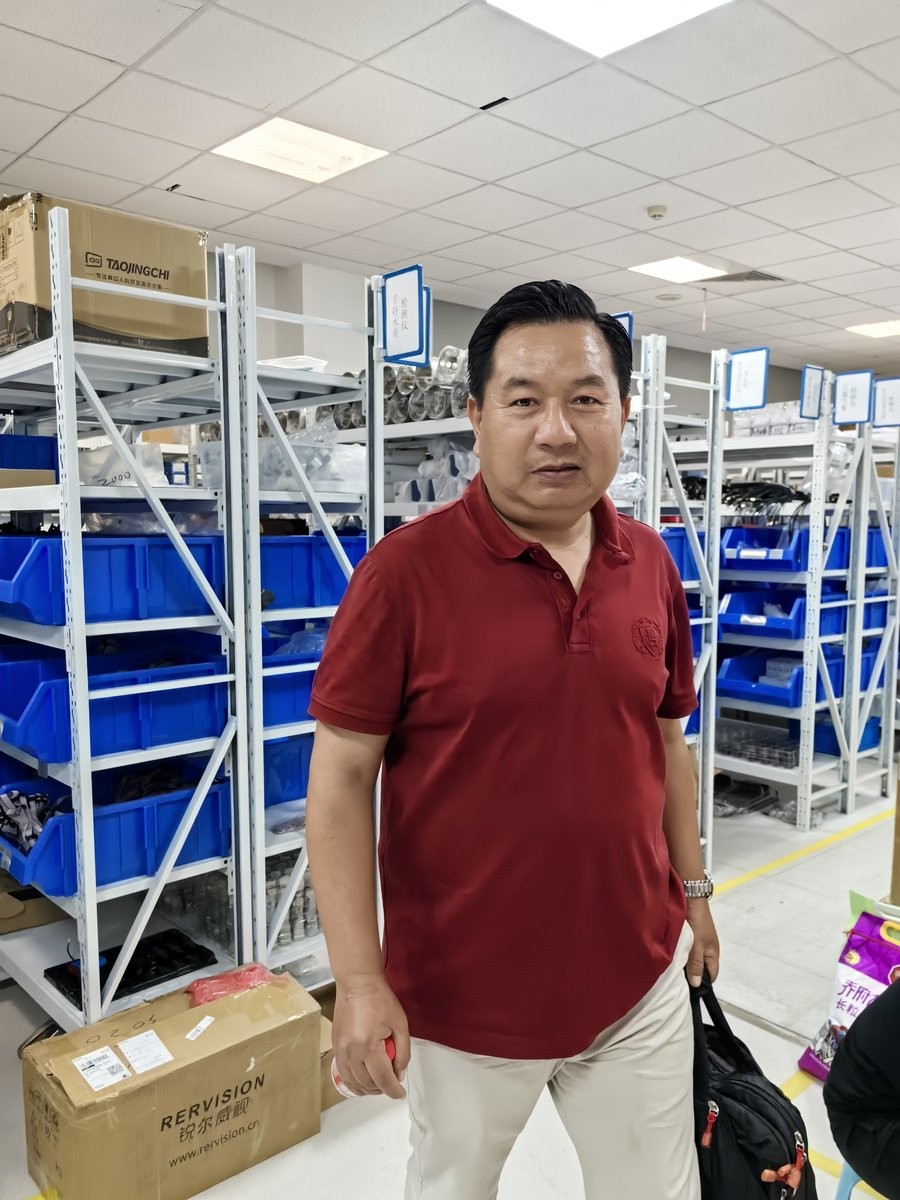 Nepali partner in the HM Instruments spare parts and component warehouse