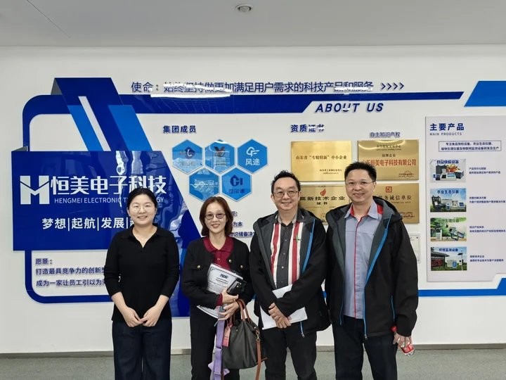 Indonesian distributor with the HM Instruments team at company headquarters