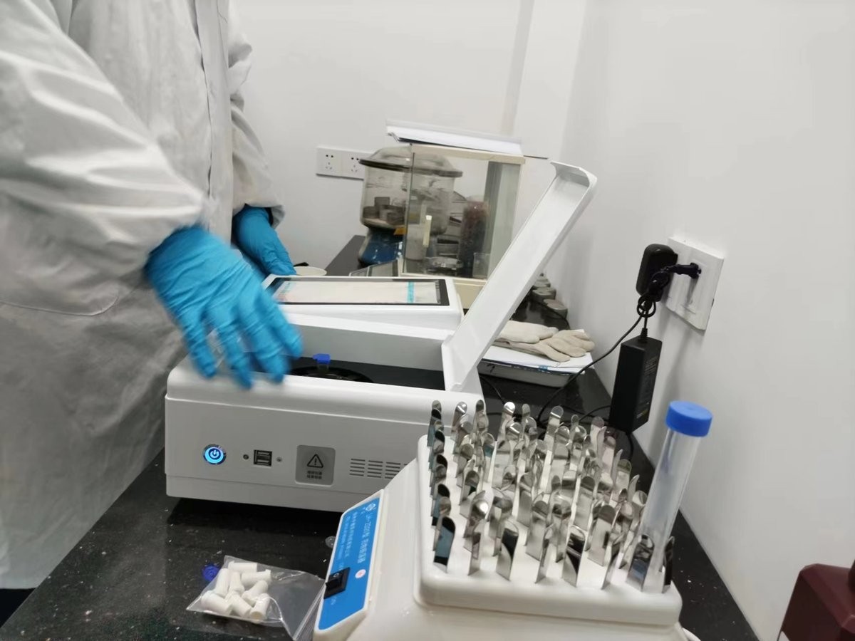 Close-up of HM-GW rice freshness meter sample tubes and reagent handling