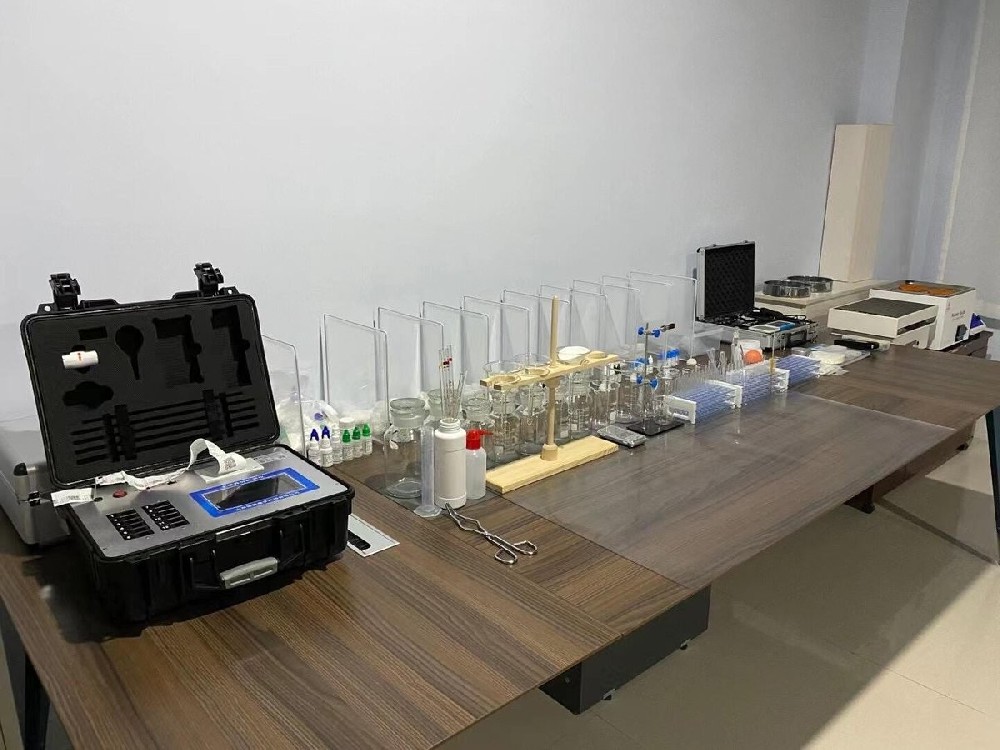 Inner Mongolia Lvtianfeng soil testing lab bench with HM-GT2 analyzer and glassware