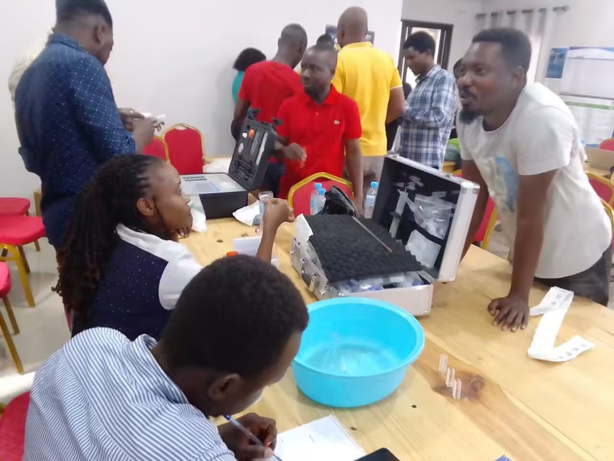 Participants practising sample preparation with opened HM-GT5 instrument cases