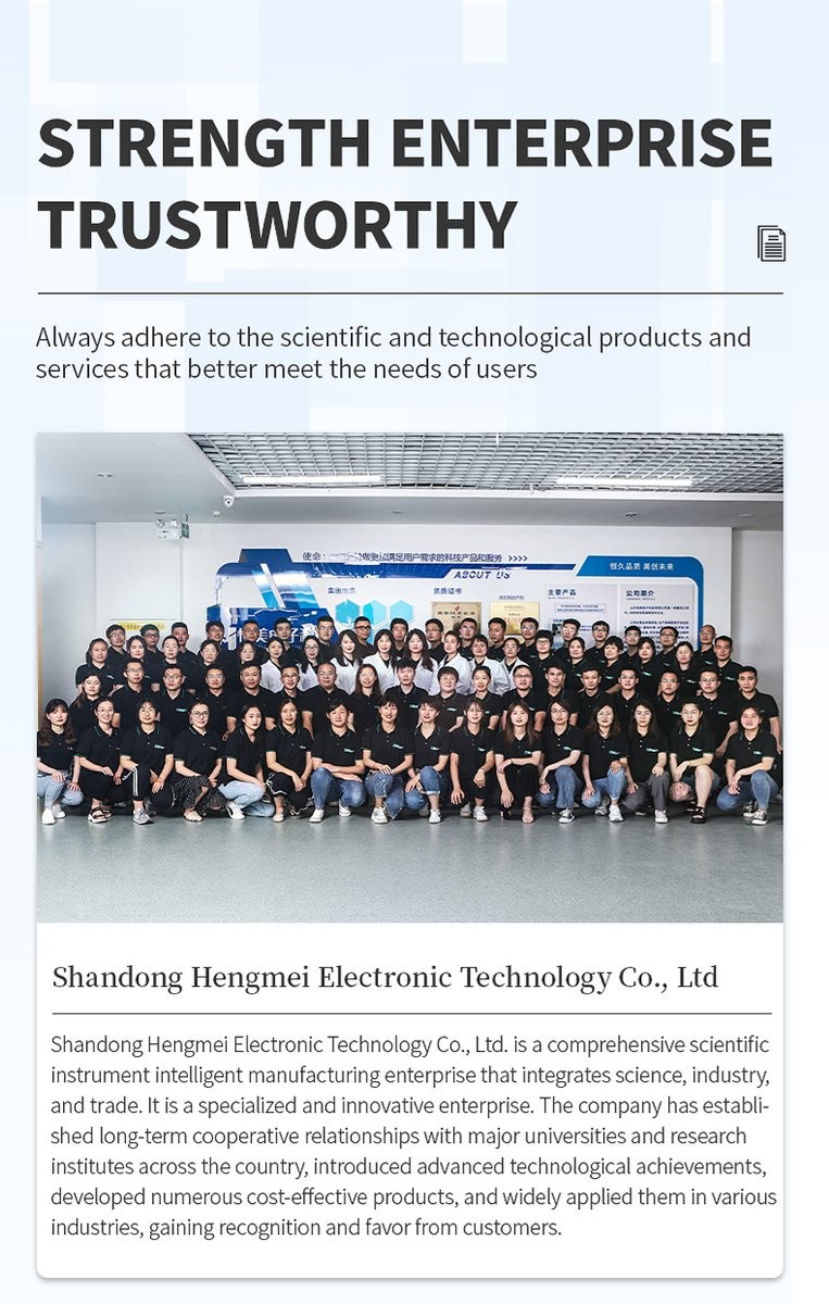 HM Instruments team group photo in a modern technology facility